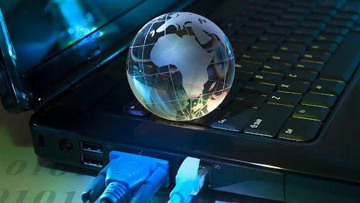 hi tech earth globe against fiber optic background